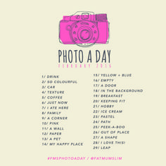 a pink camera with the words photo a day written in white and red on it