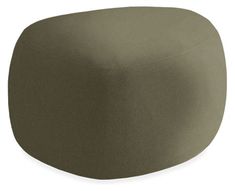 an olive green ottoman cover on a white background