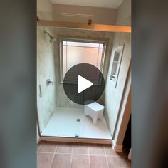 a walk in shower sitting next to a window