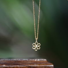 "Tiny Flower Diamond Necklace, Floral Dainty Necklace Gold 14K Solid , Nature Jewelry, Minimalist Solid Gold Charm Necklace, Gift for Her Diamond Flower Necklace with 14k solid gold chain. Tiny pendant is set with genuine natural round brilliant diamonds. Both the pendant and chain weigh a total of 1.00 gr.  ▶ Product Details ○ Diamond: 100% Natural Diamond ○ Diamond Weight: 0.01 CTW  ○ Pendant Size: 5 x 5 mm ○ Color: G Color  ○ Clarity: VS-SI ○ Cut: Brilliant Cut ○ Metal: 14K Solid Yellow Gold  ○ Gold Color Options: Yellow Gold , White Gold  ○ Adjustable Chain Length: 16\" - 18\" - 20\"  ♦ Handmade 🚚 SHIPPING All items are handmade to order. Therefore, the whole process of crafting and shipping generally takes 2-4 business days. If you need your order by a certain date, please send us a Gold Flower Shaped Necklace For Everyday, Yellow Gold Sterling Silver Flower Necklace, Minimalist Yellow Gold Necklace With Flower Charm, Everyday Gold Flower Necklace, Delicate Yellow Gold Flower Necklace, Delicate Flower Shaped Everyday Jewelry, Delicate Everyday Flower Shaped Jewelry, Delicate Flower-shaped Everyday Jewelry, Dainty 14k Gold Flower Pendant Necklace