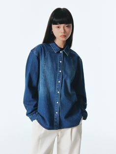 Editor's NotesThis is a denim shirt with a minimalist design and a western feel. It provides a clean fit with a relaxed fit, and is made of 10s cotton fabric, making it a thick denim fabric suitable for transitional seasons.- Unique slub shape stands out- The fabric surface boasts a vintage look through brush washing processing.- Create a three-dimensional silhouette with unique incision lines- Brand logo engraved on the backMeasurements(in.)ONE SIZE (XS-M)- Length: 28.35 in.- Shoulder: 18.11 in.- Chest: 20.87 in.- Hem: 22.05 in.- Sleeve length: 22.83 in.- Sleeve width: 8.66 in.- Sleeve hem: 4.33 in.*The actual size may have errors depending on the measurement method.*Model size: Height 5'58, Bust 31, Waist 24, Hip 34Composition & Care- 100% Cotton- No dry cleaning- Be sure to hand was Western Denim Shirt, Line Branding, Denim Ideas, Denim Blouse, Fabric Making, Classic Wardrobe, Feel It, Denim Fabric, Denim Shirt