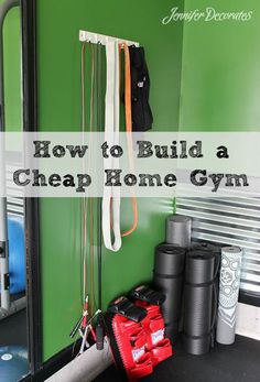 a gym room with equipment hanging from the wall and text overlay that reads how to build a cheap home gym