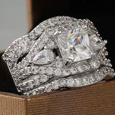 a close up of a ring on top of a box