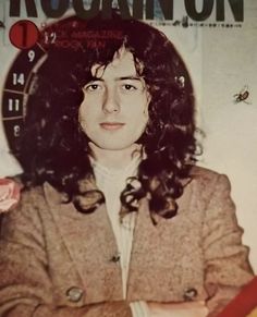 an old photo of a woman with long hair in front of a magazine cover that says rockin'on