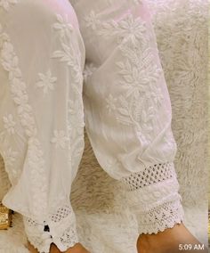 Beautiful Lucknow Chikankari ankle length Afghani  pants to give you a stylish look with your Lucknowi Kurtis or ethnic Kurtis.These pants have elastic  on the waist and dori to tie in the front. Attractive lace at the bottom. One size pant that's fits S ,M,L sizes. Fits ( US 4-6 to US 10-12sizes) Afgani Salwar, Chikankari Pants, Afghani Pants, Blouses Designs, Chikankari Suits, Pair Of, Lucknowi Chikankari, Indian Saree Blouse, Indian Saree Blouses Designs