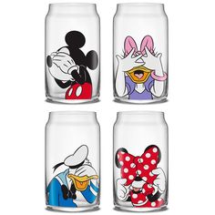 four glass jars with cartoon characters painted on them