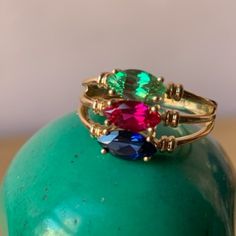 Beautiful Wide Multi Band, Modern Take On Harem Style Ring In 14k Yellow Gold. It Is Stamped P14k For Plumb 14k Gold And Also Has Been Tested To Confirm. It Also Stamped What Looks To Me Like Dq Cz, Which Means Diamonique Cz (Cubic Zirconia) , However, The Royal Blue Stone Tests On Presidium Tester As Sapphire (Synthetic, Simulated , Of Course) , Same For The Red Stone, Tests As Ruby (Again, Synthetic, Simulated), The Vivid Greeen One Tested As Spinel. The Ring Weights A Nice 3.92 Grams , Size 7 On Ring Mandrel, The Band Is Approx. 3.5mm Wide In The Back And Approx.12mm Wide In The Front. Very Sturdy,Nicely Done,Looks Amazing And Expensive On !(Even Though The Stones Are Simulated) , But Th East West Marquise Ring, East West Marquise, Ring Mandrel, Engagement Ring Antique, Red Sapphire, Marquise Ring, 3 Stone Rings, Wide Band Rings, Unique Gemstones