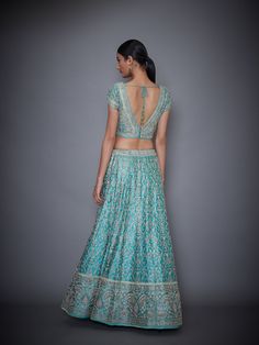 Editor's Note This set features a blue embroidered lehenga with blouse and dupatta. Neck: Sweet Heart Neckline Sleeve Type: Cap Sleeves Fabric: Silk Satin Care: Dry Clean Only Customize Your Outfit Can't find the size you're looking for? No stress. Just select size "Custom" while adding the item to your cart. We will follow up with you for your body measurements. To request a color or design customizations, please contact our customer care by using our "Ask us a question" form or simply email us Anarkali Tops For Navratri Reception, Blue Fitted Palazzo Set With Intricate Embroidery, Fitted Blue Palazzo Set With Intricate Embroidery, Blue Traditional Drape Top For Reception, Blue Tops For Reception With Traditional Drape, Fitted Blue Palazzo Set For Transitional Season, Transitional Season Fitted Blue Palazzo Set, Blue Fitted Lehenga For Transitional Season, Blue Anarkali Floor-length Blouse Piece