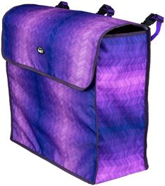 a purple and blue bag with black handles