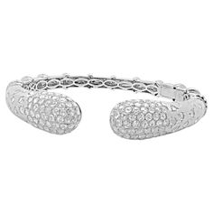 Designer: custom design Material: 18K white gold Diamonds: 250 round rose cut = 7.00cttw Color: G / H Clarity: VS2-SI1 Dimensions: bracelet will fit up to a 6.5-inch wrist Weight: 27.18 grams Diamond Cuff Bracelet, Floral Cuff, Modern Bracelets, Cuff Bangle Bracelet, Gold Bracelet Cuff, Gold Cuffs, Rose Gold Diamonds, Cuff Bangles, G H