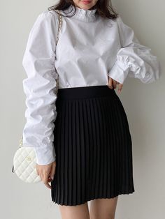 Cotton blouse with high ruffle collar. Ruched balloon-like long sleeves with wide cuff. Model is in MINUSEY ONE SIZE. Please allow 5-12 days shipping when in restocking. * MINUSEY ONE SIZE = EU 34-38, US 2-6* 100% Cotton* Dry clean* Made in Korea - Model Height: 170cm/5'7" (US2, EU34) White Blouse With Elastic Sleeves For Fall, Fall White Blouse With Elastic Sleeves, Office Blouse With Gathered Long Sleeves, White Lantern Sleeve Blouse With Elastic Sleeves, White Long Sleeve Blouse With Pleated Sleeves, White Blouse With Balloon Sleeves And Smocked Cuffs, White Balloon Sleeve Tops With Smocked Cuffs, White Balloon Sleeve Top With Smocked Cuffs, White Long Sleeve Blouse With Smocked Cuffs