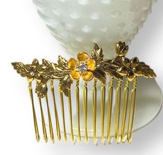 Lovey Posey Comb Absolutely Fabulous!  this stunning high quality  gold plated hair comb measures 3"x 2".  A gorgeous highly detailed solid brass blossoms adorn across the comb. And lets not forget the sweet littlte golden posey.  Look fabulous in the hair.  A welcome addition to any accessories collection Vintage Comb, Retro Bridal, Boho Jewels, Gold Hair Comb, Hair Comb Accessories, Vintage Hair Accessories, Girly Gifts, Holiday Sparkle, Brass Gold