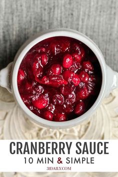 cranberry sauce in a white bowl with text overlay that reads, cranberry sauce 10 min and simple