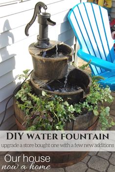 a water fountain sitting on top of a wooden barrel next to a blue lawn chair