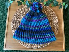 This handmade knitted hat is made with a wonderfully soft, bulky yarn.  -100% Acrylic  This would make the perfect gift for a loved one or yourself! One size (Adult - Men and Women): Fits most adult heads comfortably and offers some stretch in the material. **Pom Pom not removable. *Ribbed Texture * Brim is Double Knit - Hand-wash only, lay flat to dry.   Please be aware you are buying a Hand Knit Loom item. This is Not factory made there might be little unique area's in your scarf. Little fuzzy Knit Loom, Coffee Jewelry, Earrings Handmade Boho, Patriotic Earrings, Handmade Boho Jewelry, Knit Hat For Men, Winter Knit Hats, Hand Knit Hat, Pumpkin Earrings