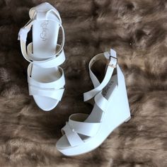 Brand New With Box Features A Ankle Strap Closure Chic White Faux Leather Heels, White Ankle Strap Heels In Faux Leather, White Faux Leather Heels For Summer, White Ankle-high Faux Leather Heels, White Faux Leather Heels With 4-inch Heel, White Stacked Heel Heels In Faux Leather, White Faux Leather Heels With Stacked Heel, Gold Wedge Shoes, Navy Wedges