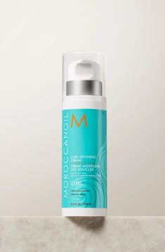 Moroccan Oil Curl Defining Cream 8.5 OZ for wavy to curly hair. An all-in-one curl styling cream that defines and enhances the curl pattern while fighting frizz, conditioning, and boosting shine. DETAILS Easily activate and define curls while hydrating hair. Moroccanoil Curl Defining Cream is one of our most popular products for curly hair. This argan oil-infused curl definer features an advanced heat-activated technology that provides a curl memory factor to fight frizz and create well-defined, Wavy To Curly Hair, Rizos Curls Curl Defining Cream, Curl Defining Mousse, Moroccan Oil Curl Defining Cream, Curl Styling, Creme Of Nature Curl Activator, Define Curls, Curl Defining, Curl Defining Cream