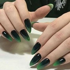 There is a time and place for classic nail shades, but if you’re looking for a contemporary twist, look no further than… Ombre Goth Nails, Green Goth Nails Grunge, Black And Green Ombré Nails, Dark Green Ombre Acrylic Nails, Villian Era Nails, Dark Green Gradient Nails, Ferxxocalipsis Nails, Goth Chic Nails, Goth Coffin Acrylic Nails