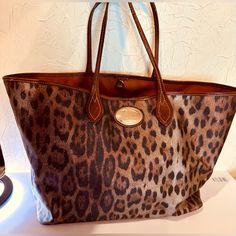 Used But It Good Condition. Handles A Little Worn Out. Leopard Print Tote Shoulder Bag With Handles, Roberto Cavalli Animal Print, Leopard Print Bag With Gold-tone Hardware For Daily Use, Leopard Print Bags With Gold-tone Hardware For Shopping, Rectangular Leopard Print Shoulder Bag With Gold-tone Hardware, Roberto Cavalli, Brown Gold, Animal Print, Bag Lady