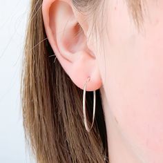 Model is wearing 30mm diameter hoop earrings, 925 Sterling Silver: size medium. * Comes as a pair--a left and right side, each hammered on one side. * Also available in 14K gold filled, and 14K rose gold filled. * Made with 16 ga wire (1.3mm thick) * End of hoop is thinned out to about 21 gauge, to easily slip through ear * Hammered texture HOOP CLOSURE: * Latch back: end of the earring passes through a hole on the opposite side of the hoop, creating a continuous loop. OR * Butterfly clutch: hoo Sterling Silver Hypoallergenic Hoop Earrings For Everyday, Sterling Silver Hoop Earrings For Everyday, Everyday Hypoallergenic Sterling Silver Hoop Earrings, Sterling Silver Hoop Earrings With Simple Design, Hypoallergenic Sterling Silver Hoop Earrings, Dainty Sterling Silver Hoop Earrings, Hoop Jewelry, Butterfly Clutch, Earrings Minimalist