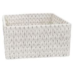 a white woven basket with handles