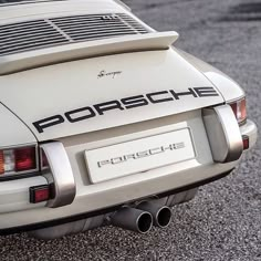 the back end of an old porsche sports car