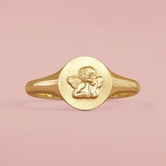 Made of solid 14k gold (not plated, not filled, not vermeil), this ring is available in your choice of yellow, white, or rose gold (as well as platinum upon request) This sweet style makes a great pink ring! Metal: 14K Solid Gold Top Dimensions: 8.5mm Back: Closed Back Surface Finish: Bead Blasted/Polished Made-to-order, this item typically ships within 1-10 business days. However, during periods of increased order volume, please allow up to 3 weeks for item to ship. For rush order requests and immediate availability, please message shop directly prior to purchase. Gift box included. Please note that all sales are final and not eligible for return or exchange. Thus, please make sure to read description fully and review all pictures before completing your purchase. If you have any questions Rose Gold Plated Signet Ring Gift, Rose Gold 14k Signet Ring Gift, 14k Gold Jewelry With Certificate For Anniversary, Cherub Ring, Fancy Jewellery, Gold Top, Ring Metal, Pink Ring, Sweet Style