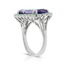 Large amethyst gemstone surrounded by a halo of emeralds make this a statement ring that will be an exciting color enhancement to any of your outfits. Part of the Hawaii Collection by Lisa Bridge, this ring was inspired by the hot tropical colors seen in the flora of Hawaii. Green Amethyst Rings In Fine Jewelry Style, Formal Green Amethyst Ring With Accent Stones, Green Amethyst Ring For Formal Occasions, Formal Green Amethyst Ring With Gemstone Accents, Green Amethyst Ring Fine Jewelry, Tropical Colors, Emerald Ring, Amethyst Gemstone, Statement Ring