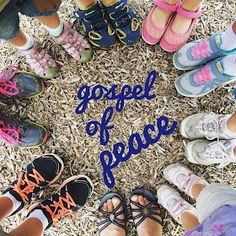 a group of people standing in a circle with the words go get peace written on it