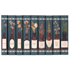 six books with vases and flowers on them are lined up against a blue background