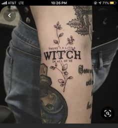 a person with a tattoo on their arm that says, there is a little witch in all of us