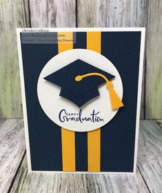 a graduation card with a blue and yellow striped background that says congratulations on the front