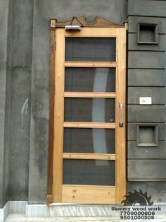 an open wooden door on the side of a building