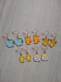 ❤ INFORMATION ❤  These funny earrings have golden plated hooks. There are different variants available. The earrings are a nice colorful addition to any outfit, for a cheerful look for yourself or as an original gift for someone else! Sold per pair and you will receive the earring stoppers.  The size of the Bul charm is 21x23 mm.  The size of the Pika yellow charm is 19x22 mm.  The size of the Pika black charm is 21x20 mm.  The size of the Eev charm is 21x20 mm.  The size of the Duck charm is 13 Kawaii Metal Jewelry For Gifts, Kawaii Gold Nickel-free Jewelry, Kawaii Nickel-free Gold Jewelry, Gold Nickel-free Kawaii Jewelry, Handmade Kawaii Gold Jewelry, Handmade Gold Kawaii Jewelry, Gold Novelty Earrings For Gifts, Themed Gold Earrings For Gifts, Novelty Gold Nickel-free Earrings