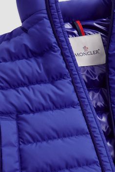 Part of a functional wardrobe of an active kid, the Contrin down vest is designed to allow both freedom of movement during play and protection. The puffer vest is finished with an elastic logo trim. Functional Blue Nylon Puffer Jacket, Blue Nylon Sporty Puffer Jacket, Sporty Blue Nylon Puffer Jacket, Functional Wardrobe, Down Jackets, Down Vest, Freedom Of Movement, Puffer Vest, Down Jacket