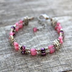 The bracelet is handmade using fresh water pearl and cateye. The fuchsia is a lively and feminine color, a nice blend of passion and tenderness The length of the earrings is 7-8 ¼ inches, 18-21. (excluding the length of hook) For matching earrings, please go to1: https://www.etsy.com/listing/95985512/earrings- For matching earrings, please go to2: https://www.etsy.com/listing/151339368/earrings?ref=shop_home_active For matching necklace, please go to: https://www.etsy.com/listing/118410657/neckl Elegant Pink Nickel-free Bracelets, Pink Hypoallergenic Jewelry Gift For Her, Hypoallergenic Pink Jewelry Gift For Her, Delicate Pink Bracelets For Jewelry Making, Adjustable Pink Pearl Bracelet Gift, Pink Round Beads Jewelry For Bridesmaid Gift, Delicate Pink Pearl Bracelet For Gift, Delicate Pink Pearl Bracelet As A Gift, Delicate Pink Pearl Bracelet As Gift