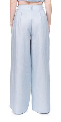 Indulge in comfort and style with the Parker Trouser Silver Blue by POSSE. Made from certified linen, these trousers feature a flattering high-rise waist, roomy wide legs, and front pleats for added volume. Pair with the matching Lorenzo Vest for a chic ensemble or dress down with a tank and slides. Details: Color: Silver Blue 100% European Flax Certified Linen Double hook & bar opening, concealed center front fly zip Front pleats Side seam pockets High rise, wide leg fit Vendor Code: PS1114-SBL Blue Wide Leg Linen Pants, Blue Linen Wide-leg Pants, Blue Linen Wide Leg Pants, Blue Linen Ankle-length Wide Leg Pants, Linen Wide Leg Pants For Daywear, Elegant Blue Linen Pants, High-waisted Linen Wide Leg Pants For Daywear, Blue Linen Wide-leg Bottoms, Blue Linen Wide Leg Bottoms