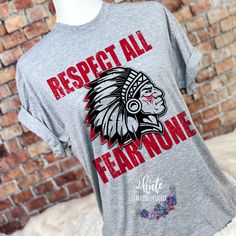 Treat yourself or anyone in your life to this awesome School pride tshirt. Great for all occasions. And great for supporting your Indians team. Shirt is made of 100% polyester and soft to the touch. To get the best wear from your shirt please 1. Wash with mild detergent 2. Do not use fabric softener 3. Do not use bleach 4. Tumble dry low. Please enjoy your shirt as I know we have enjoyed all the ones we have made for ourselves!! Please note that every shirt is made to order and normal processing Indians Shirt Designs, School Spirit T-shirt With Sublimation Print For Sports Events, Game Day Fan Apparel T-shirt With Mascot, Collegiate Mascot T-shirt For Fans, Team-colored Mascot T-shirt For Sports Events, Mascot T-shirt For Football Season Sports Events, Fan Apparel T-shirt With Mascot For Game Day, Fan Apparel T-shirt With Mascot For Sports Events, Fan Apparel T-shirt With Mascot