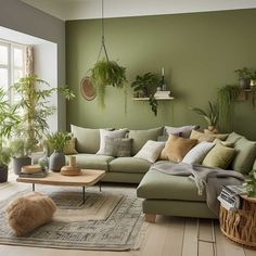 a living room filled with lots of green furniture and potted plants on the wall