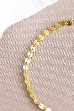 14k gold filled flat round coin chain anklet Gold Chain Anklet Gift, Gold Chain Anklets As Gift, Dainty Gold Coin Necklace With Delicate Chain, Adjustable Gold Anklet With Round Beads, Gold Adjustable Anklets With Round Beads, Gold Tarnish Resistant Anklets For Gifts, Gold Minimalist Coin Necklace With Adjustable Chain, Nickel Free Gold Round Disc Coin Necklace, Nickel-free Gold Round Disc Coin Necklace