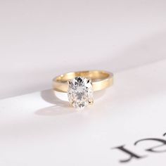 an engagement ring with a single diamond in the center