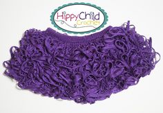 purple ruffled cloth on white background with happy child logo