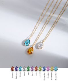 "14K Real Gold Teardrop Birthstone Necklace, Pear Shaped Cubic Zirconia Dainty Necklace for Women, Everyday Necklace, Perfect Bridesmaid Gift 📘 D E T A I L S * Solid Gold (real gold, no gold-filled or no gold plated material) * Karat: 14K (585) * Gold color: Yellow * Height of teardrop: 9.50 mm * Width of teardrop: 6.0 mm * Available chain thickness: 0.72 mm Measurements may vary slightly due to handwork. ┈ C H A I N L E N G T H O P T I O N S * 14\" choker size (No adjustable option) * 14-16\" Pear-shaped Necklaces With Sparkling Stones As Gift, Pear-shaped Sparkling Stone Necklaces For Gifts, Gold Gemstone Drop Necklace For Wedding, Pear-shaped Cubic Zirconia Gemstone Necklace, Gold Teardrop Pendant Birthstone Necklace, Drop Gemstone Necklace With Cubic Zirconia, Teardrop Pendant Necklace With Sparkling Stones For Gift, Anniversary Sparkling Stones Drop Necklaces, Sparkling Drop Stone Necklaces For Anniversary