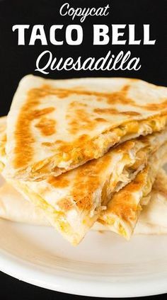 two quesadillas stacked on top of each other with text overlay that reads copycat taco bell quesadilla