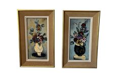 two framed paintings of flowers in vases