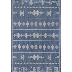 a blue rug with white designs on it