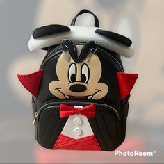 Disney Loungefly Vampire Mickey Cosplay Mini Backpack Limited Edition Sold Out No Longer Available Online Brand New Never Opened Still Sealed Up Selling As Is Unopened! Approx Size 10 1/2" H X 9" W X 4 1/2" D Themed Backpack For Cosplay, Themed Cosplay Backpack, Novelty Black Standard Backpack, Black Novelty Standard Backpack, Black Novelty Backpack For Halloween, Novelty Black Backpack, Black Backpack For Halloween Cosplay, Black Halloween Novelty Backpack, Black Disney Backpack For Halloween