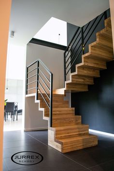 there is a wooden stair case in the house