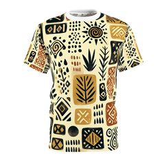 Discover the expressive charm of our abstract African Mud Cloth Inspired T-shirt. Handcrafted with love, its ochre yellow, charcoal black, and terracotta red palette highlights organic shapes, tribal symbols, and stamped motifs. Inspired by African art forms, each element - faces, diamonds, or foliage are placed with impromptu rhythm, flaunting visible paint bleed and bristle marks for a unique hand-painted feel. Perfect for those who adore creative craft and fashion fusion. #AfricanMudCloth #HandcraftedFashion #AbstractDesign #TribalTShirt #OrganicShapes #BlockPrinting #HandPaintedWearables #AfricanArtFashion #CreativeCraft #FashionFusion. Casual Yellow T-shirt With All Over Print, Artistic Multicolor Printed T-shirt, Multicolor Graphic Tee With All Over Print, Crew Neck Cotton Tops With Abstract Print, Cotton Crew Neck Tops With Abstract Print, Yellow Cotton Top With All Over Print, Yellow Short Sleeve Top With Sublimation Print, Brown Short Sleeve Top With Sublimation Print, Artistic Multicolor Print Short Sleeve Top