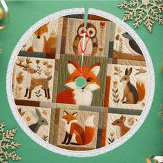 a christmas ornament with an image of foxes and other animals in the center